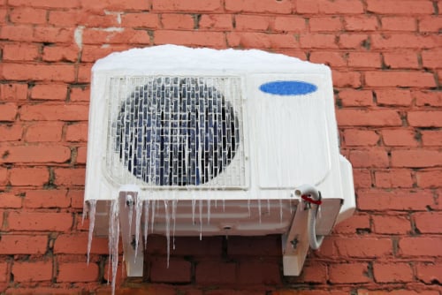 Frozen  AC Unit on Exterior of Building