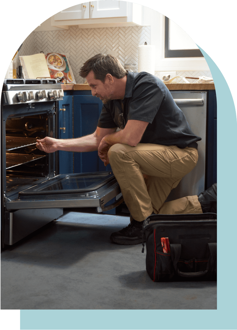 repairman fixing sink